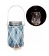 Illuminated blue glass lantern with net